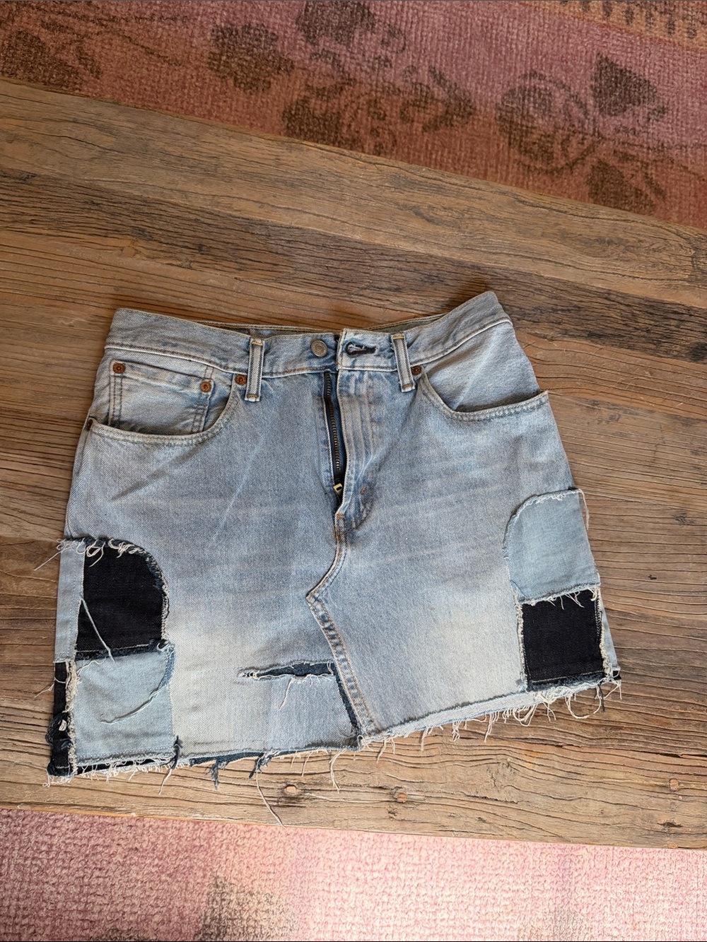 Levi's Light Blue Denim Mini Skirt with Black Patch Accents